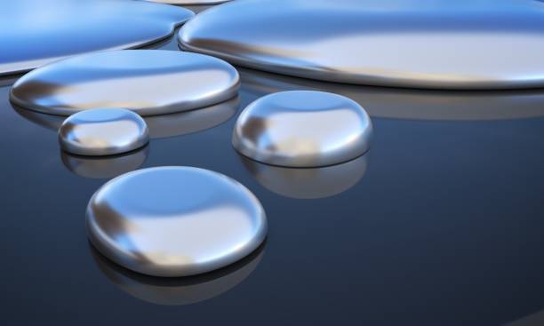 istock Droplets of liquid metal - mercury. 3D rendered illustration. 1040303704