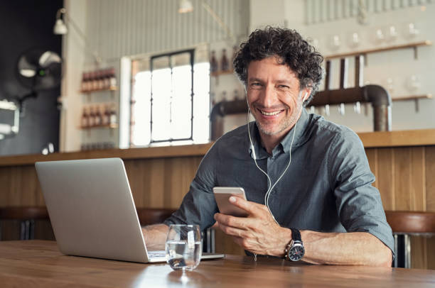 Businessman with headphones during a call