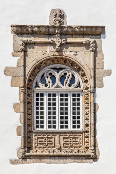 Braga, Portugal - September 11, 2017: Window in the Manuelino style (Portuguese Gothic) from the Coimbras House. Braga city, Portugal. Photographed from public area.