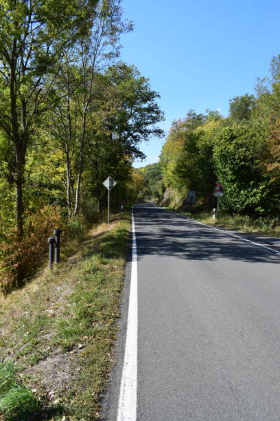 istock country road in autumn 1040309646