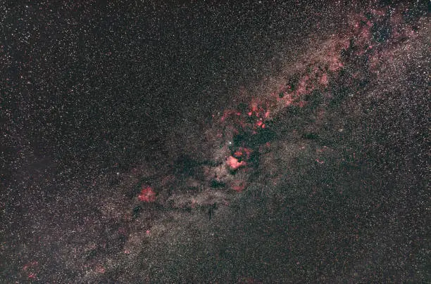 Extreme exposure of the milky way galaxy. NGC7000 region being shown at a focal length of 18mm. Dust lanes, clouds and blankets of stars visible.