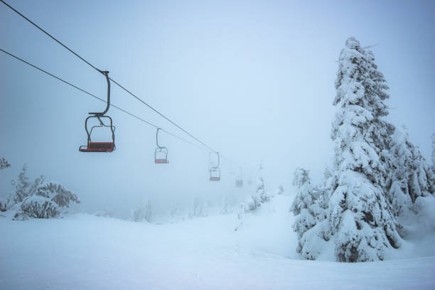 istock Ski lift in winter mountains 1040319162