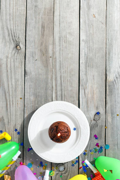 istock Chocolate muffin candle and decoration party 1040328974