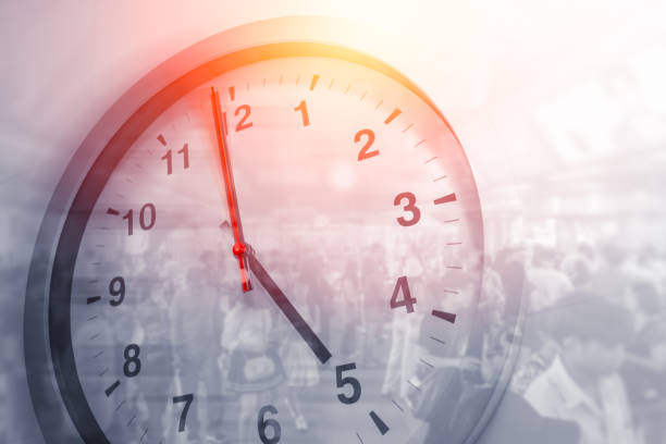 istock Business times hours concept people crowded walking overlay with time clock 1040332900