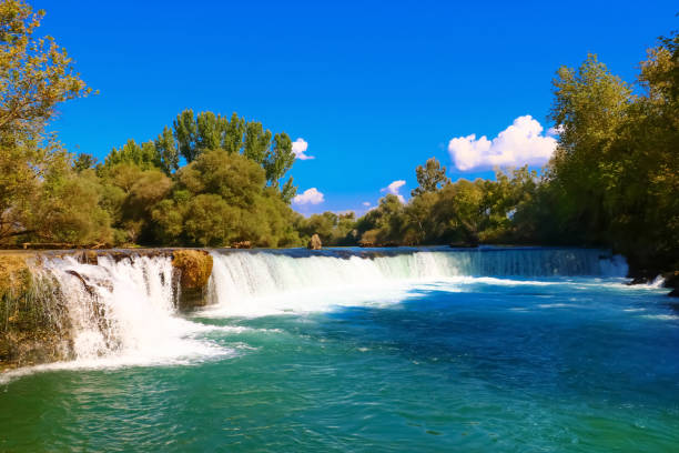 istock landscape with a waterfall on a sunny day 1040334830