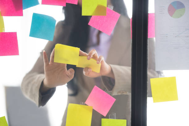 istock Businesswoman putting her ideas on glass. 1040337552