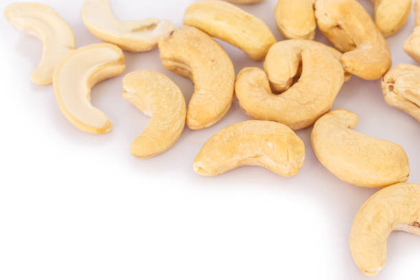 istock heap cashews on white background. 1040337678