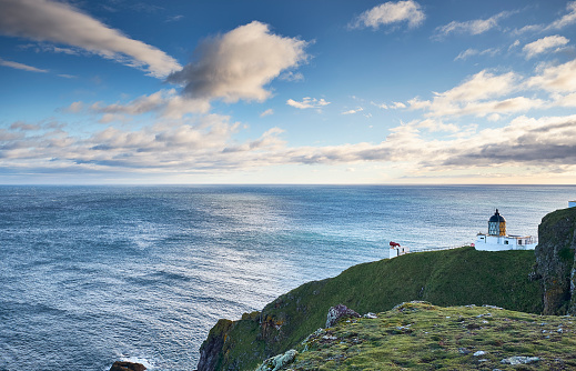 Lighthouse at St Abb's Head, a rocky promontory and a national nature reserve in Berwickshire, Scotland