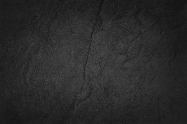 istock Dark grey black slate texture in natural pattern with high resolution for background and design art work. Black stone wall. 1040342620