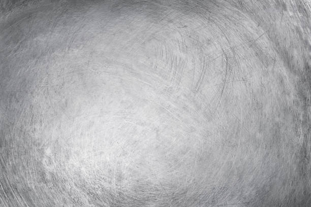 istock aluminium texture background, scratches on stainless steel. 1040342640