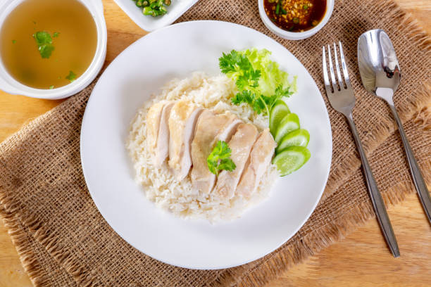 istock hainanese boiled chicken rice on the wooden table 1040359642