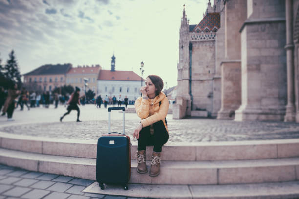 Tourist woman traveling in Europe stock photo