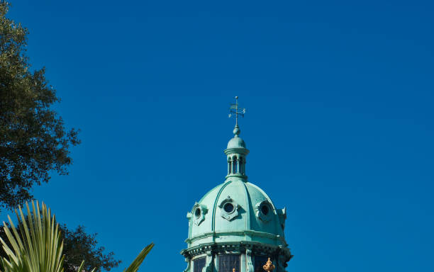 istock Light green dome with a windmill on the round top 1040364086