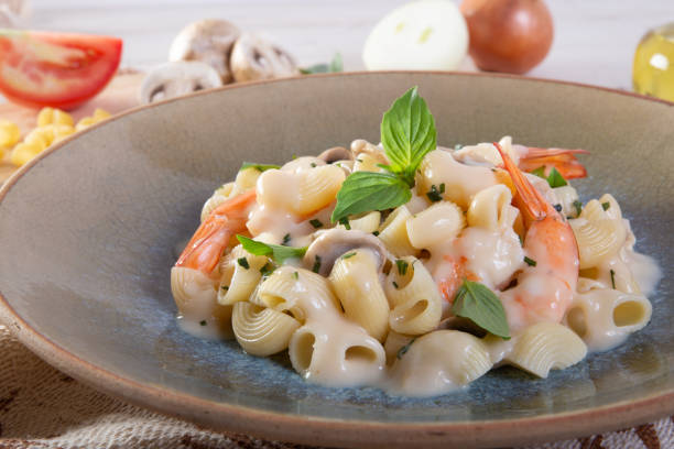 istock Spaghetti with shrimp and basil on a plate 1040364480