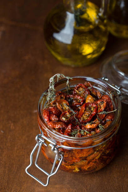 istock Sun dried tomatoes with herbs and spices 1040372406