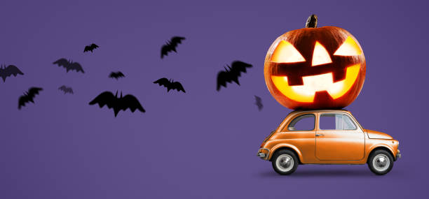 istock Halloween pumpkin on car 1040376022