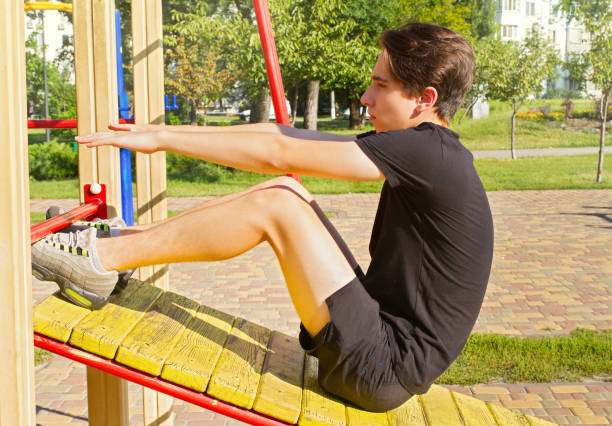 istock Young fit man exercising in a park, workout 1040379674