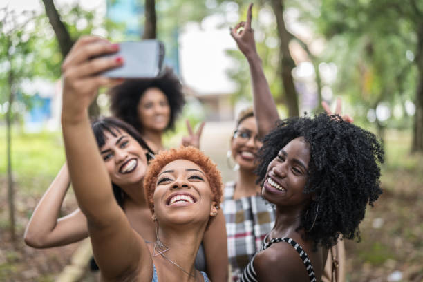 istock Multiracial Young Friends Group Taking Selfies And Have Fun Together 1040382612