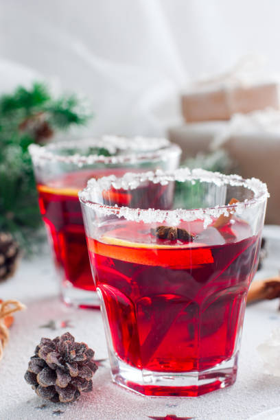 istock Non-alcoholic mulled wine with lemon and cinnamon in glass glasses, selective focus 1040382842