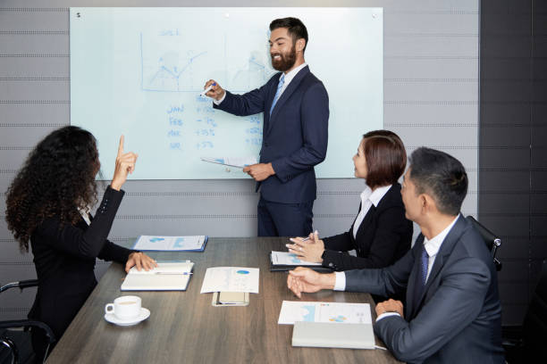 istock Businesspeople having meeting in conference hall 1040386124