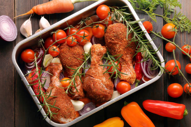 Raw marinated chicken drumsticks legs ready for bake or grill and bbq