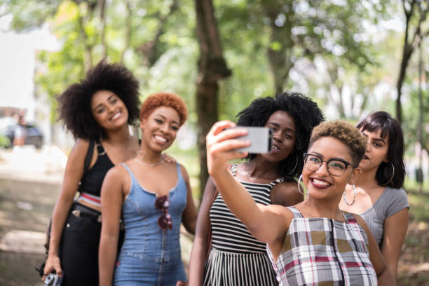 istock Multiracial Young Friends Group Taking Selfies And Have Fun Together 1040390716