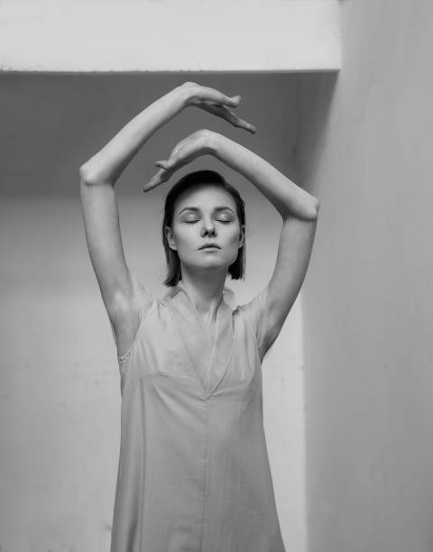 istock Young woman with her hands up posing in studio 1040391244