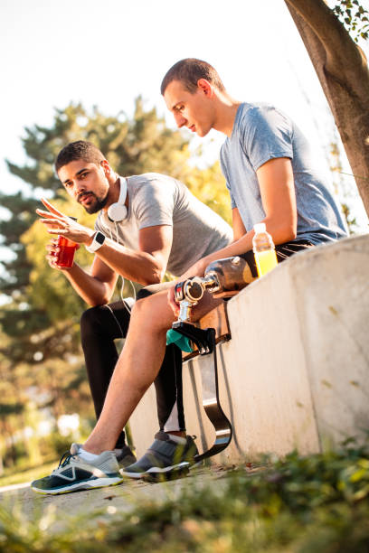 istock Friends resting and hydrating after running 1040391288
