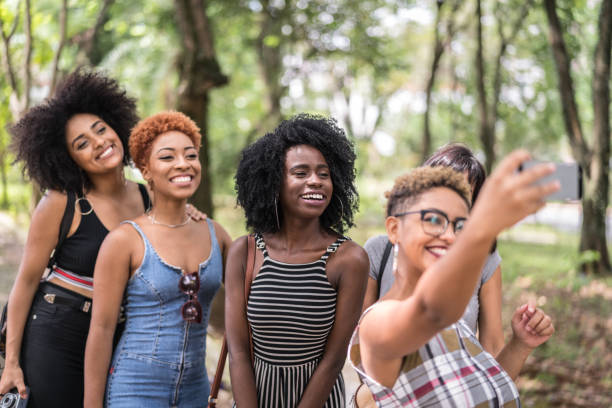 istock Multiracial Young Friends Group Taking Selfies And Have Fun Together 1040391692