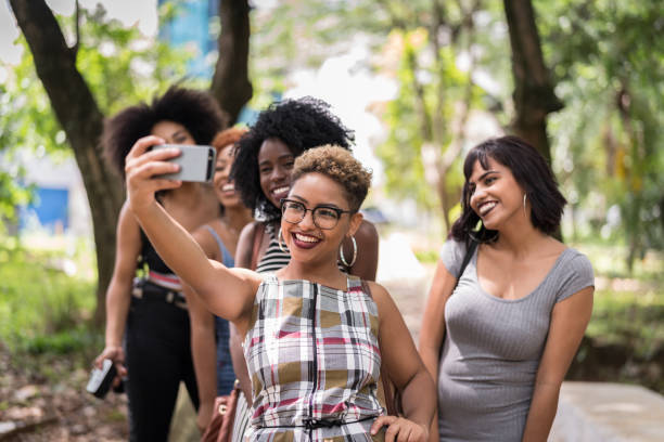 istock Multiracial Young Friends Group Taking Selfies And Have Fun Together 1040394416