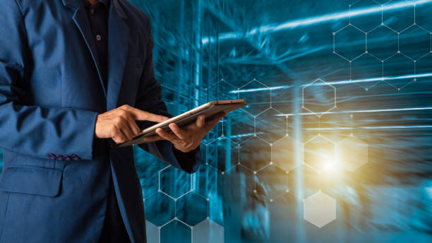 istock Businessman manager using tablet check and control for workers with Modern Trade warehouse logistics. Industry 4.0 concept,planning of logistics, Transportation within the country and Global. 1040404332