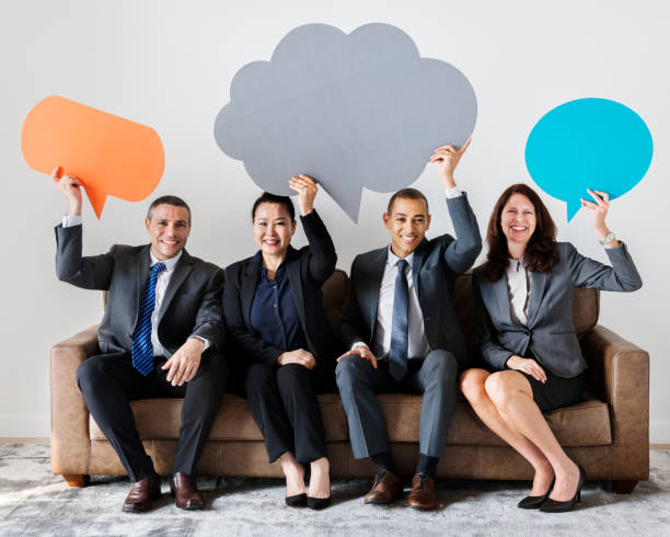 istock Business people sitting together with icons 1040412002