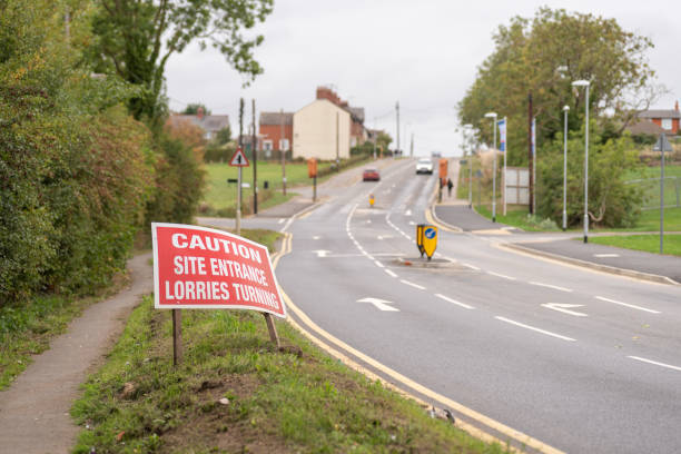 istock Caution site entrance lorries turning warning road sign on British road daylight view 1040414964