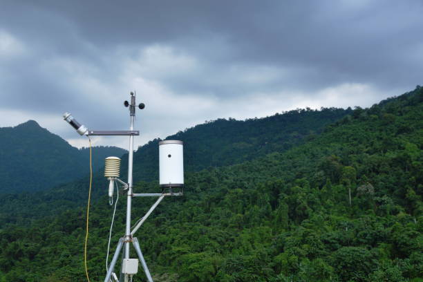 istock pluviometer or rain gauge with rain cloud on sky 1040417494