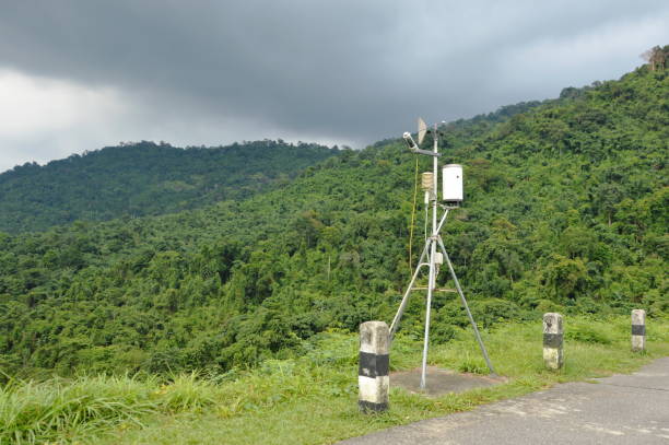 istock pluviometer or rain gauge with rain cloud on sky 1040417522