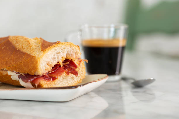 Sandwich and coffee for breakfast stock photo