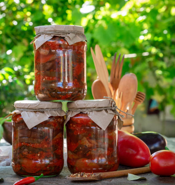istock jars with rolled marinated pieces of eggplant in vegetable sauce 1040425120