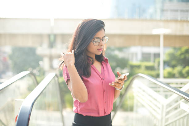 istock Businesswoman using mobile phone 1040426206