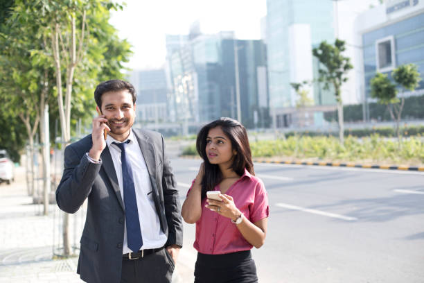 istock Business people talking on mobile phone 1040426456