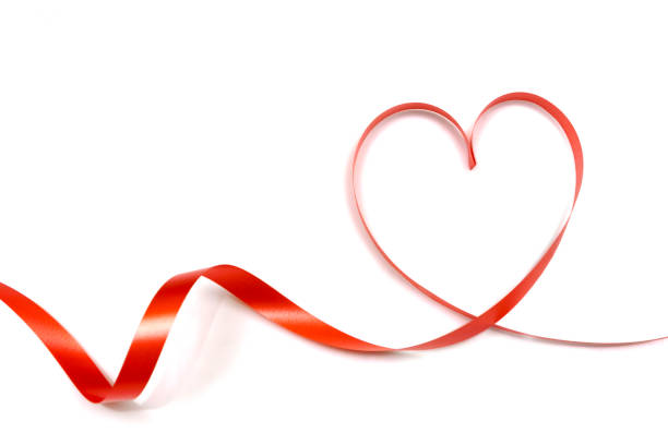 red ribbon heart shape isolated on white background stock photo