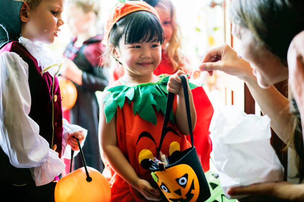 istock Little children trick or treating on Halloween 1040431260