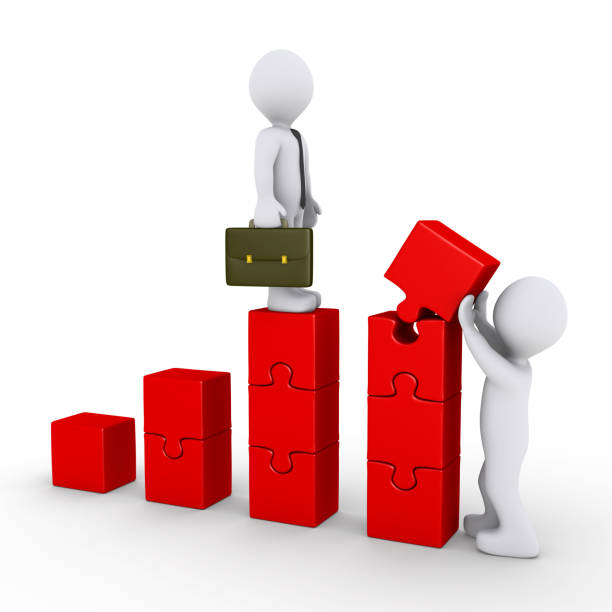 istock Person is building a puzzle-graph for businessman 1040431502