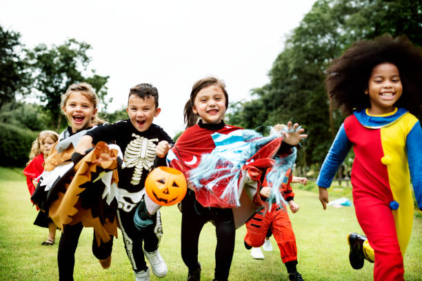 istock Little kids at a Halloween party 1040431794