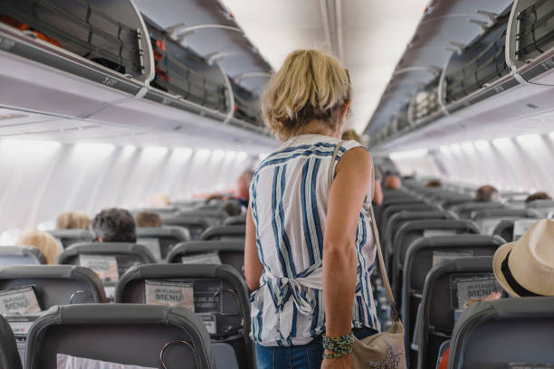 Taking Her Seat on the Airplane
