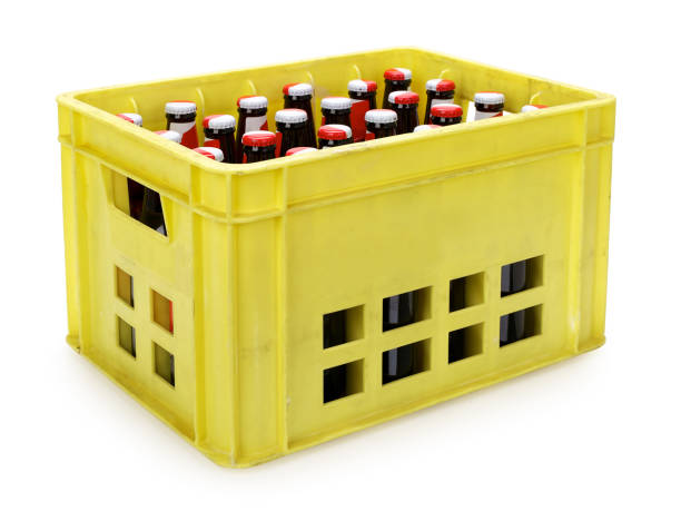 Yellow beer crate with bottles on white, contains clipping path Yellow beer crate with bottles on white, contains clipping path beer crate stock pictures, royalty-free photos & images
