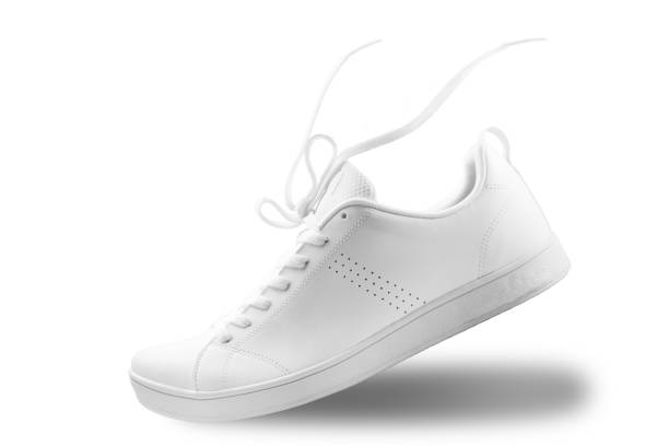 One White sneaker and floating rope  isolated on white background with clipping path