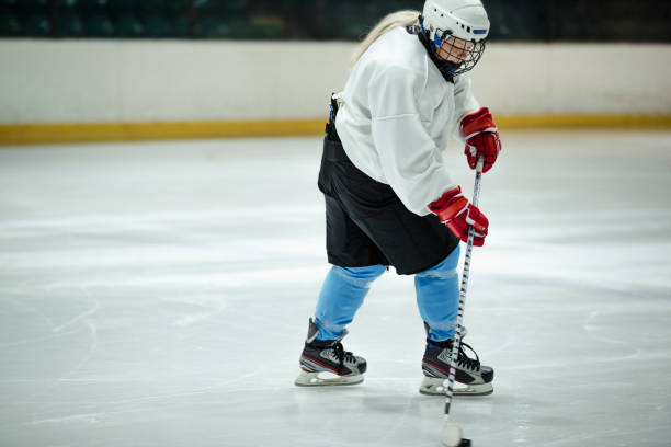 istock Skating with the Hockey Puck 1040449424