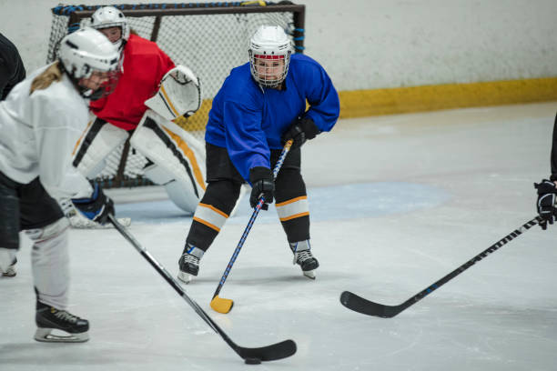 istock Women Playing Ice Hockey 1040450044