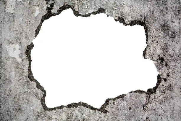 Broken old grunge wall on white with clipping path, concept of escape