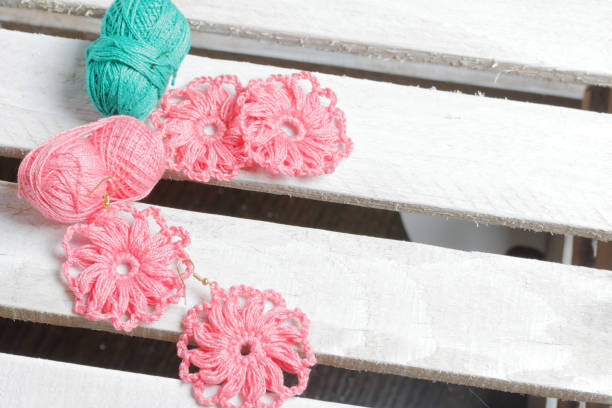 istock Earrings knitted by an entrepreneur. 1040451666